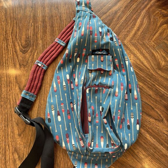 Kavu Rope Sling Bag Turquoise Row House Backpack Paddle Novelty Print Unused - Picture 1 of 5